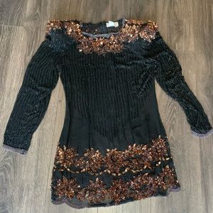 Alyce Designs Vintage sheer beaded dress
Size 12